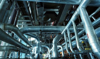 Interior view of metal pipes at a large industrial plant